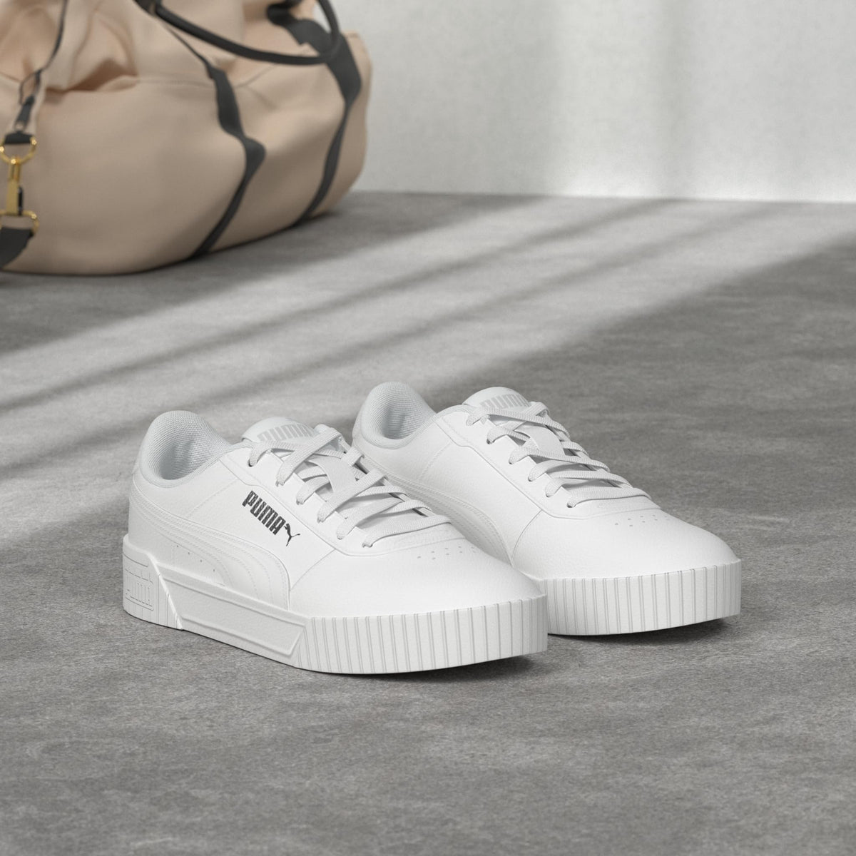 PUMA Women's Carina Leather Sneaker