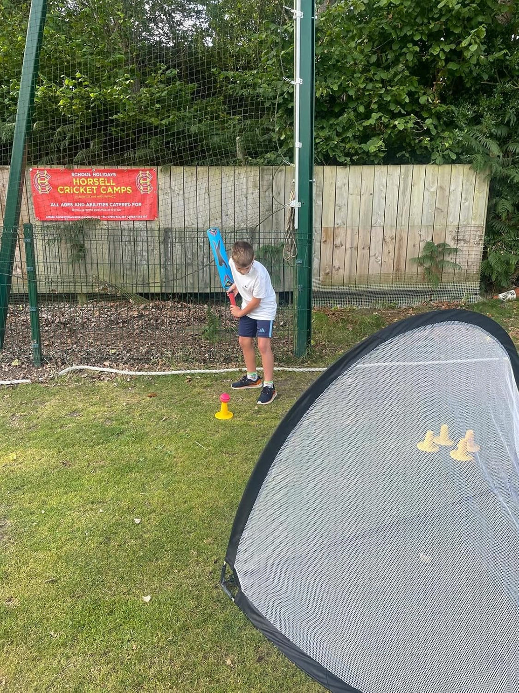 Ram Cricket pop-up ball stop net. Quick setup, portable for multi-sport use